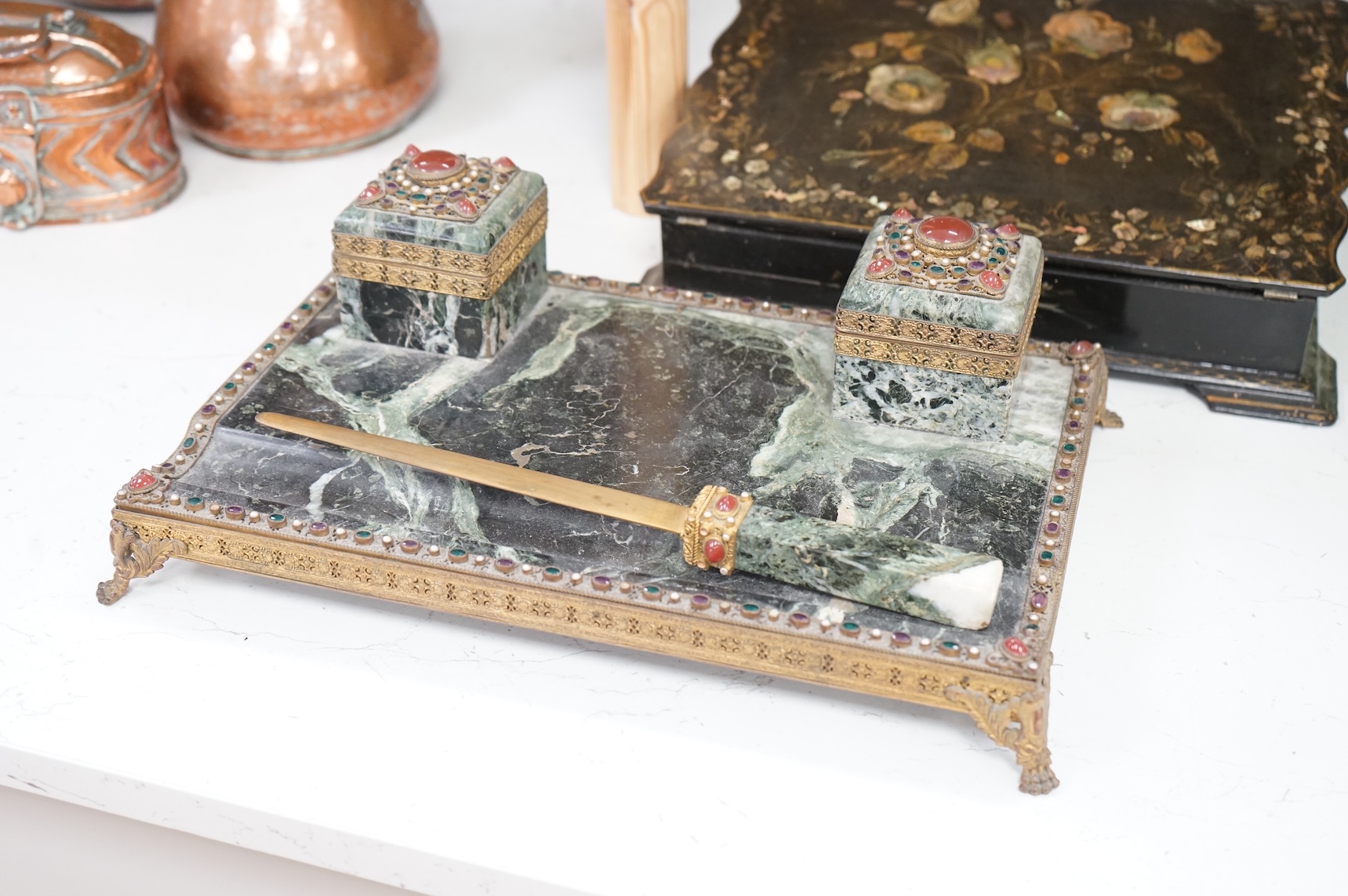 A Victorian papier maché mother of pearl inlaid writing slope and a 19th century French marble desk stand, 36cm wide